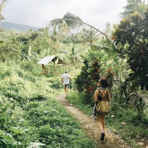 solo girl traveler in bali hiking adventure remote working